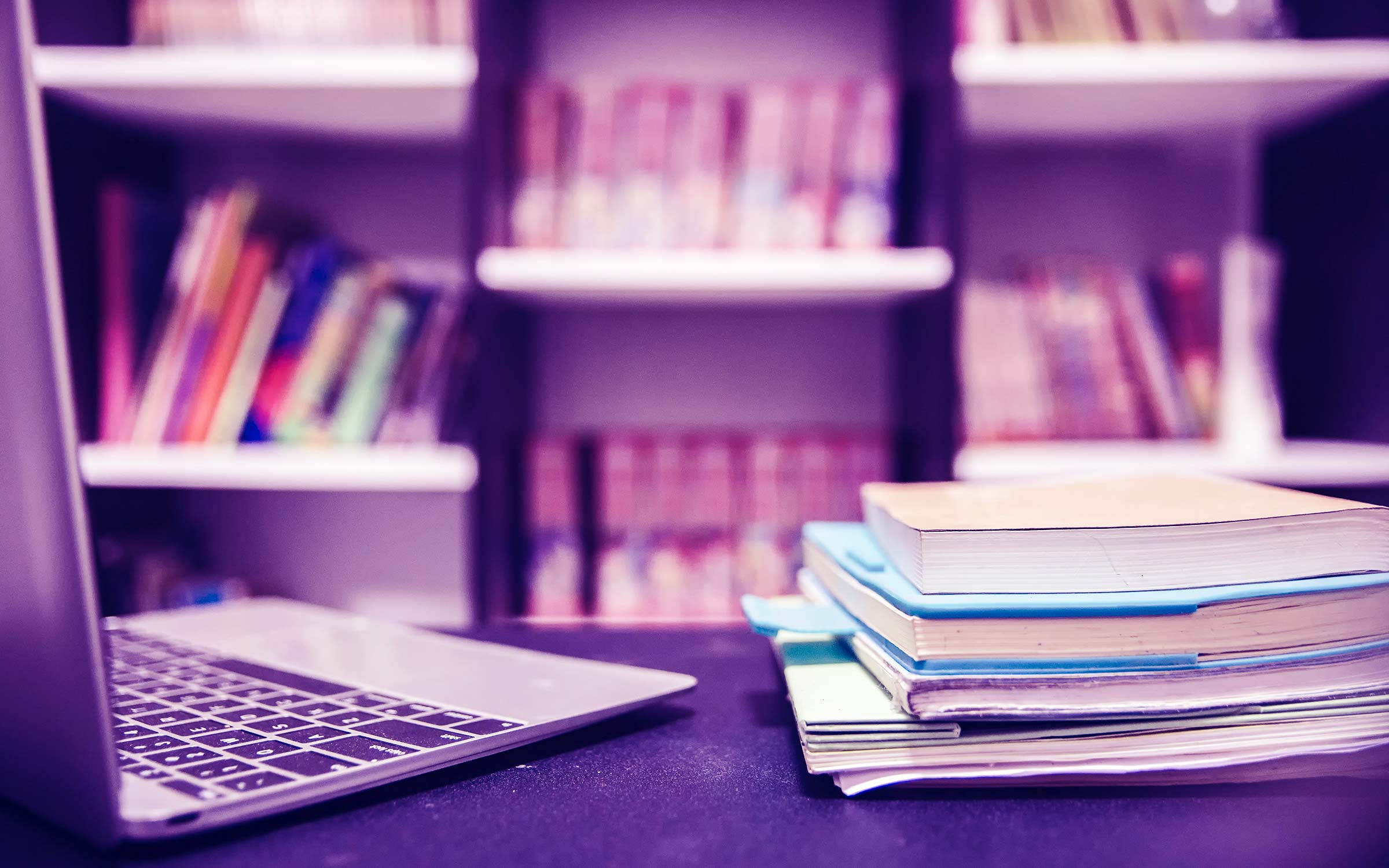 Laptop and books.